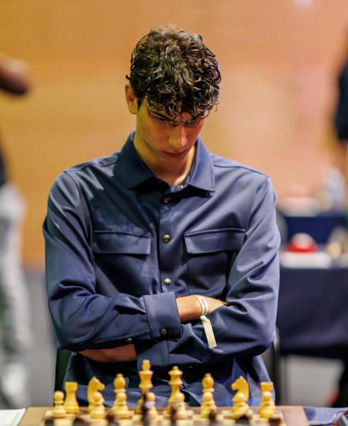 Zachary Saine at the chessboard during a tournament